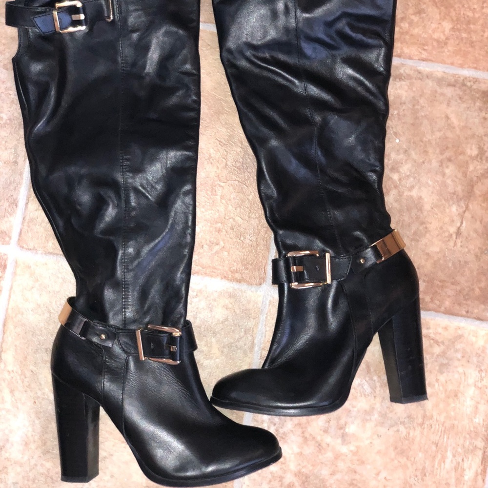 Aldo Black knee-high boots with the gold accent